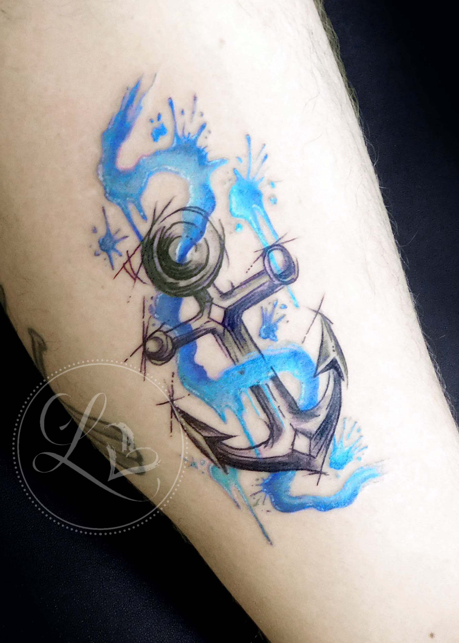 Watercolor splash anchor tattoo