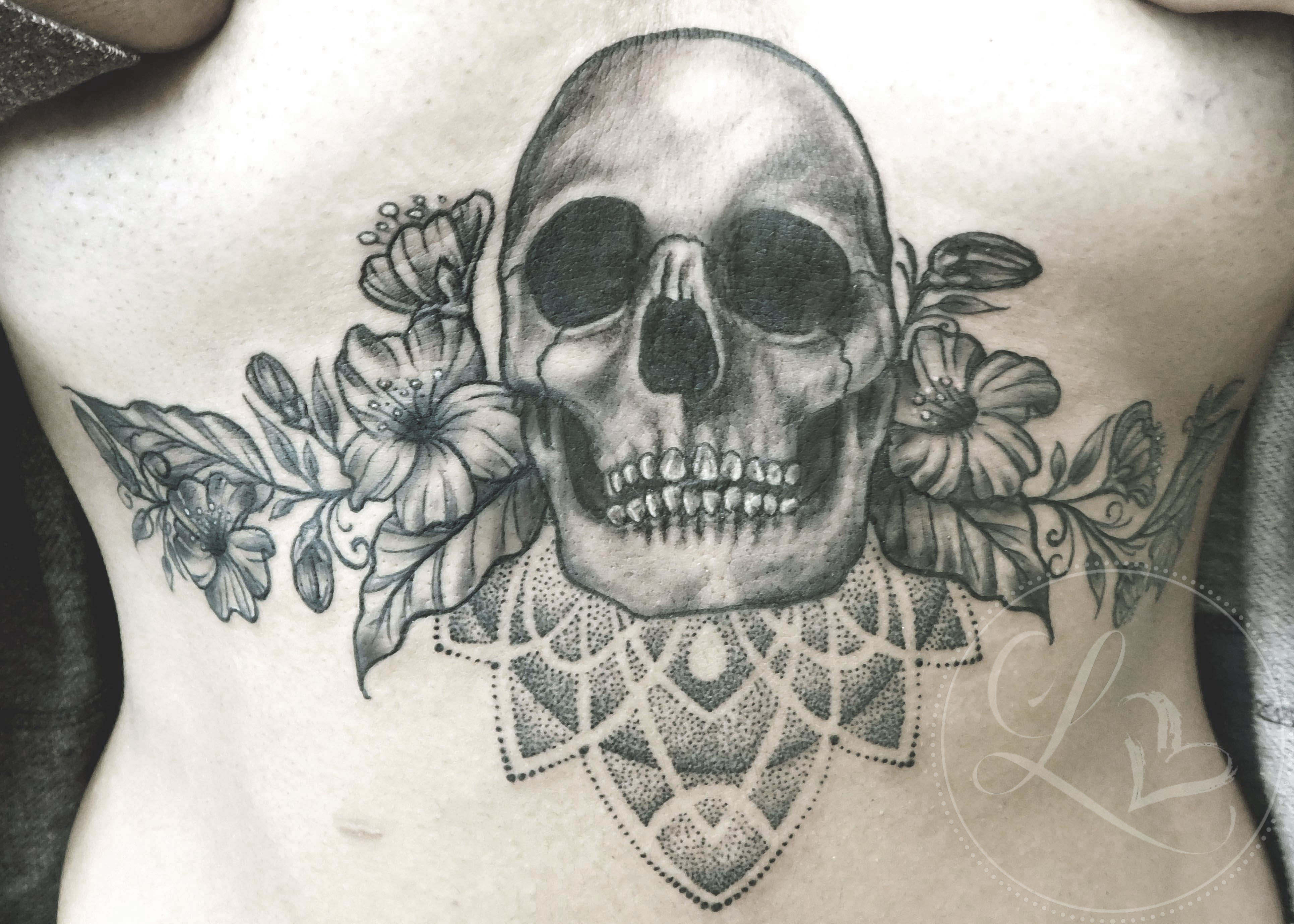 Flowers floral skull dotwork pointillism underboob sternum tattoo