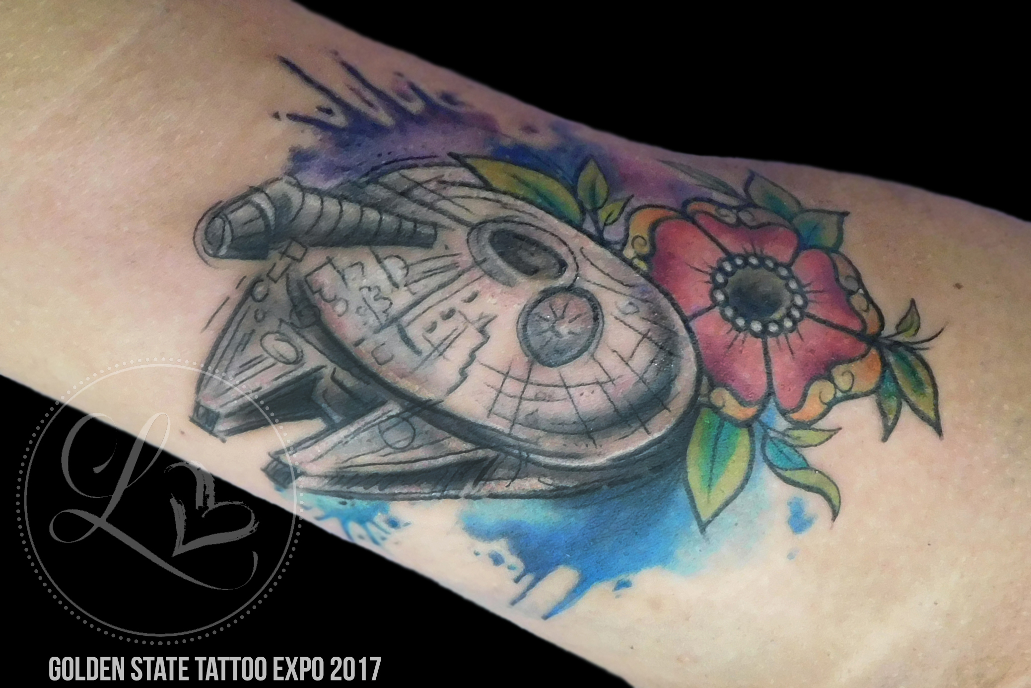 Watercolor Star Wars millenium falcon tattoo with flowers