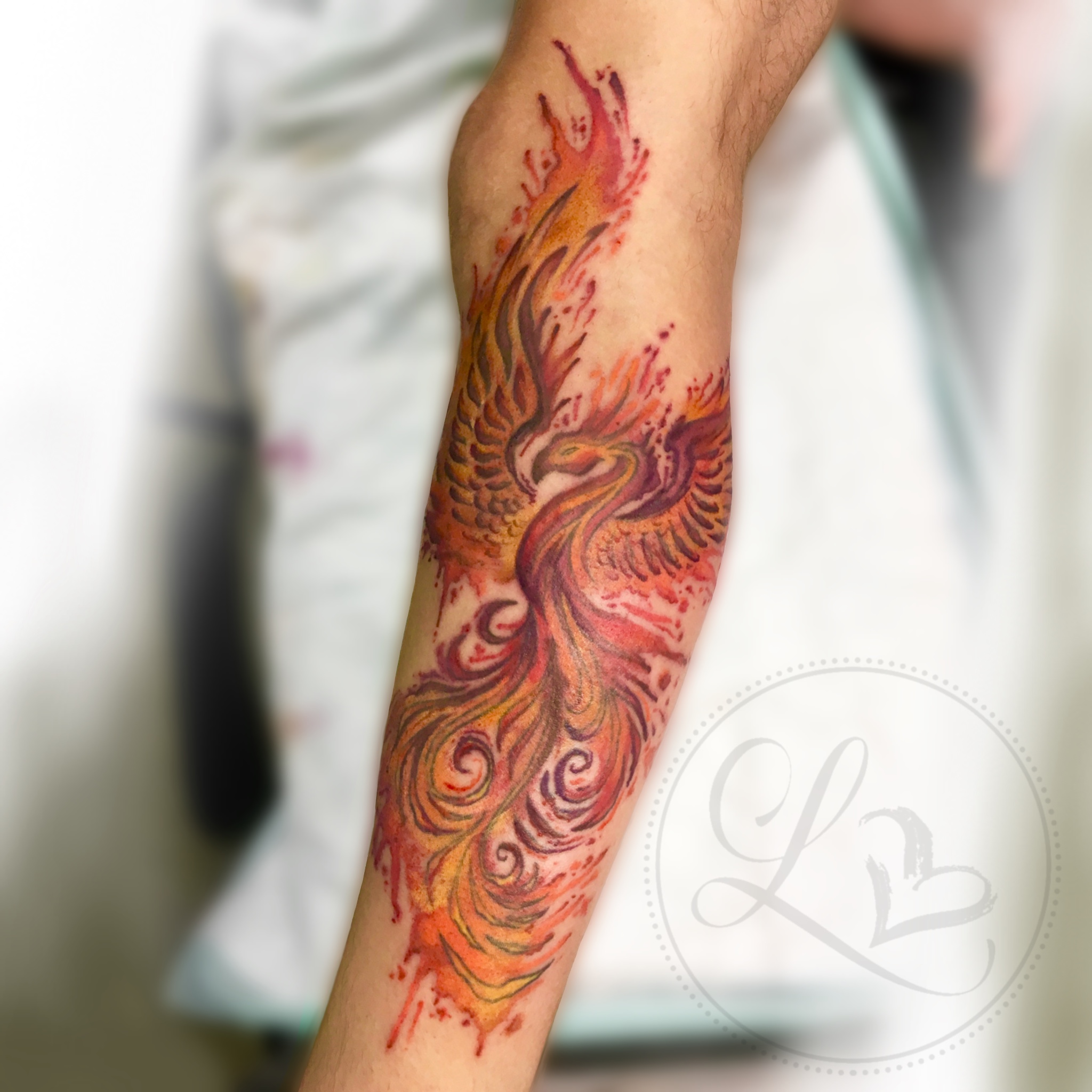 Watercolor color phoneix tattoo