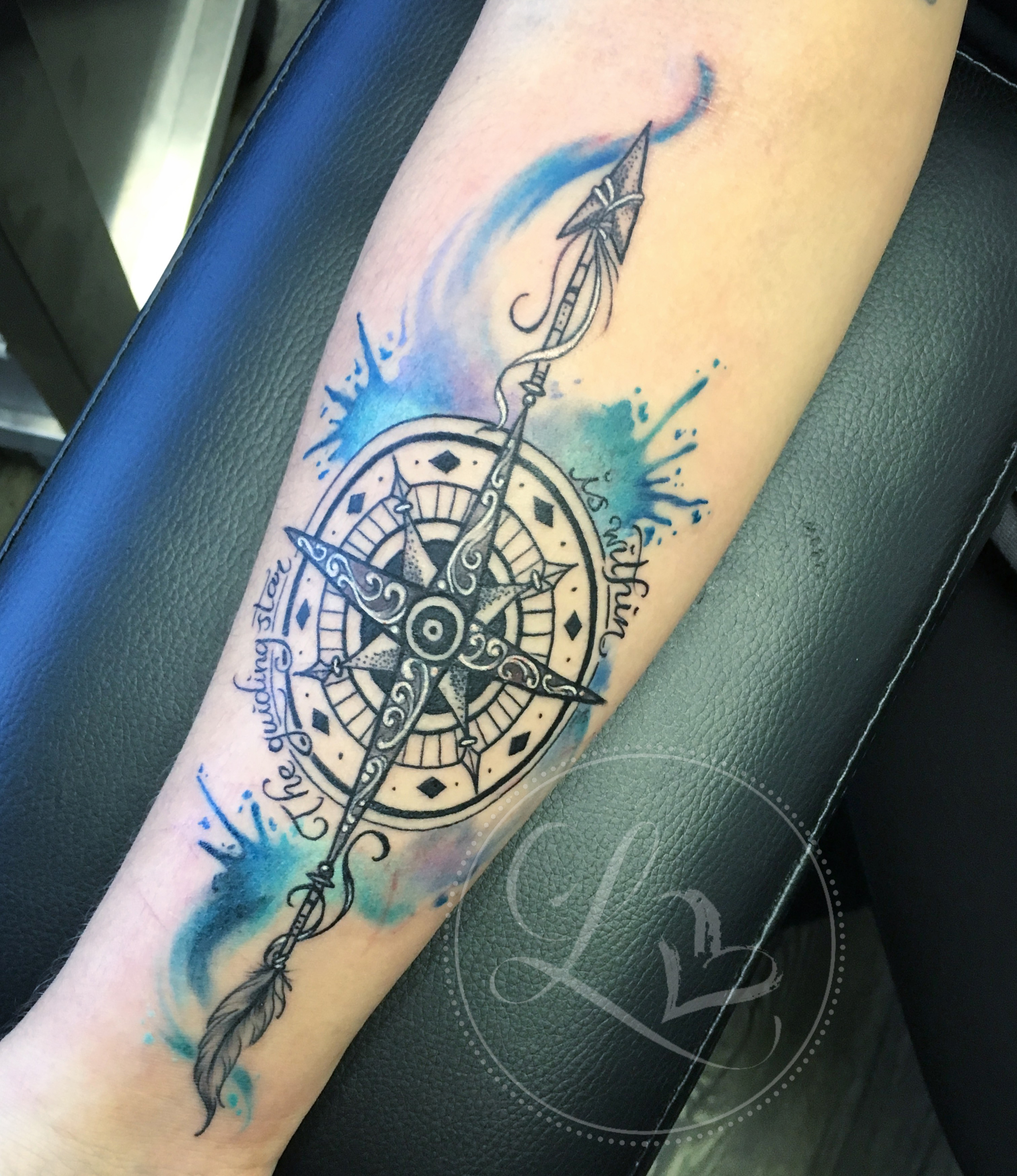 Watercolor style tattoo with an intricate detailed dotwork compass and arrow