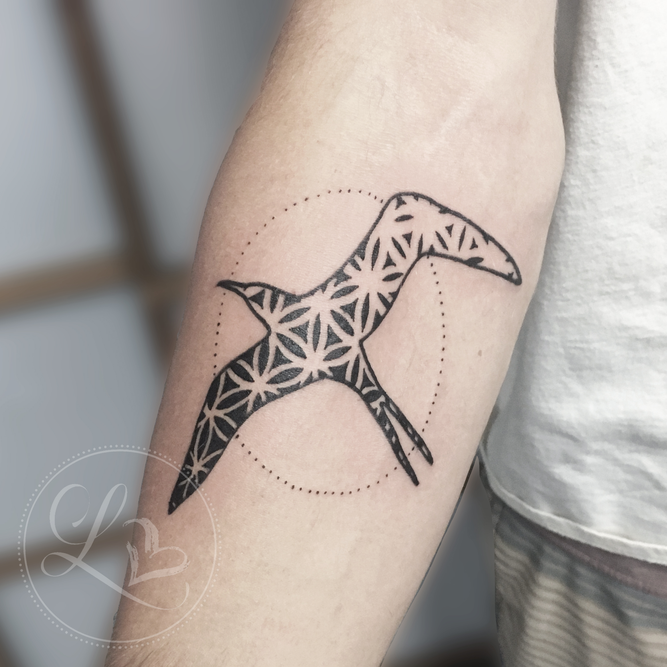 geometric sacred geometry iwa bird forearm tattoo