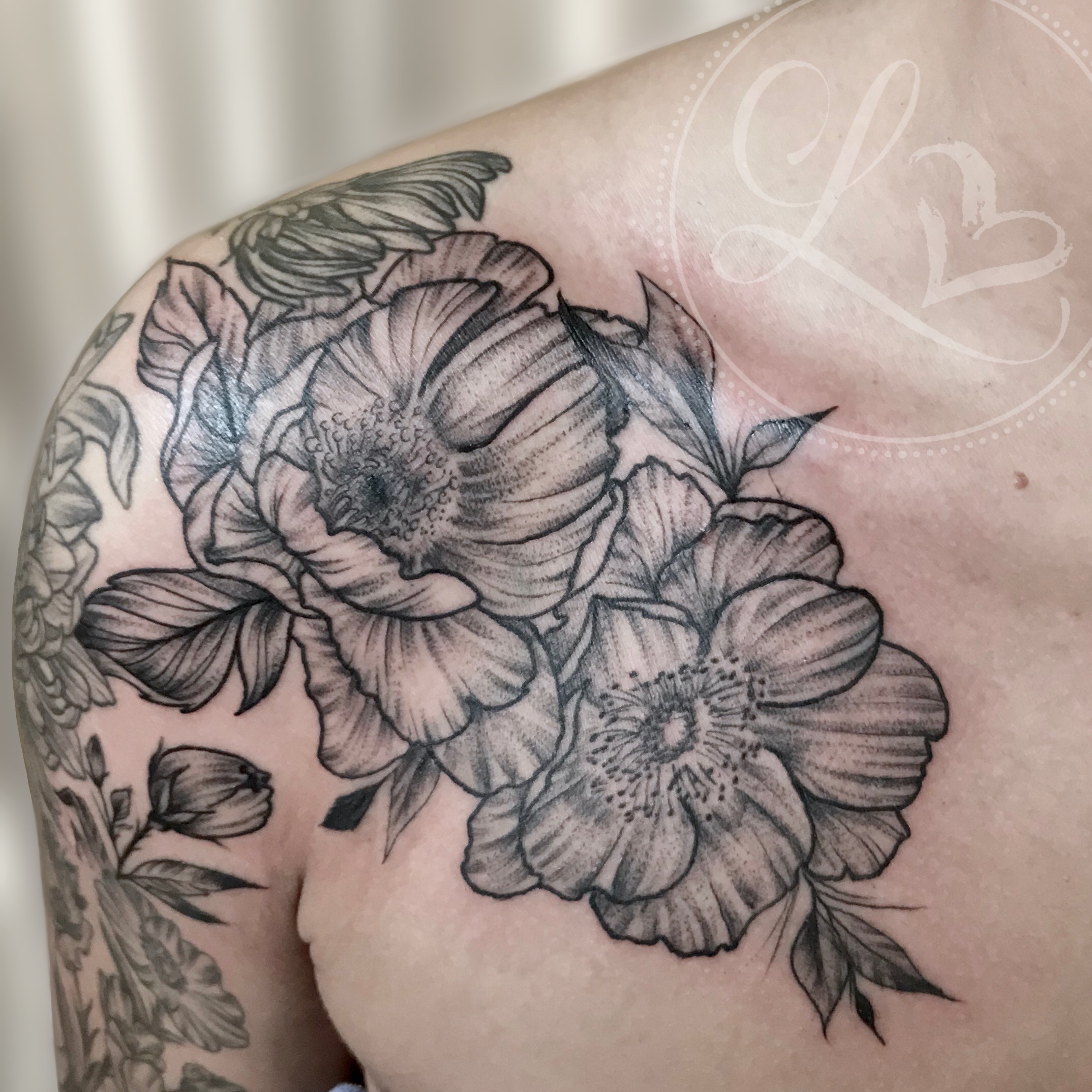 detail linework peony flower floral chest tattoo