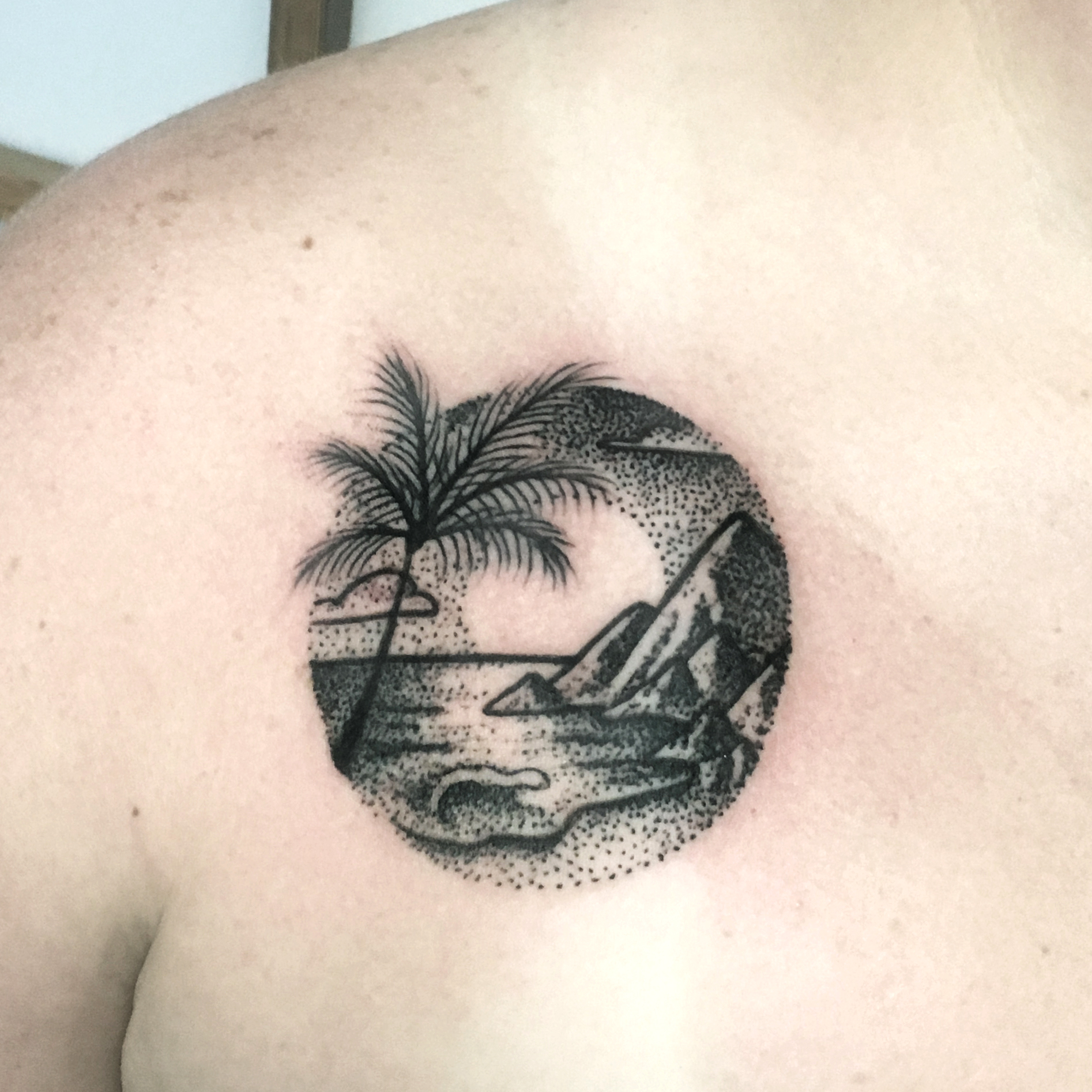 Dotwork pointillism palm tree ocean beach island sunset tattoo