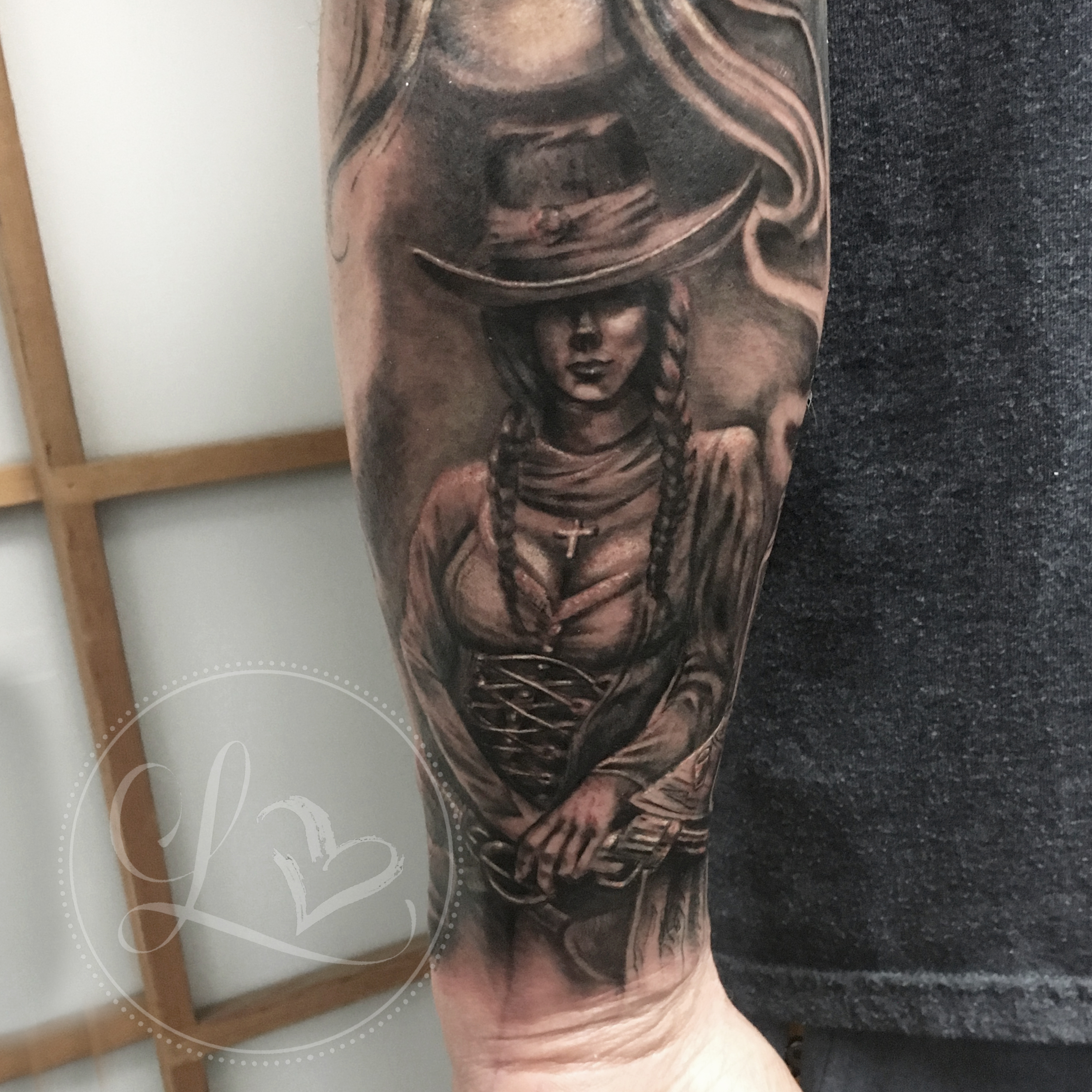 Gunslinger cowgirl black and grey realistic portrait tattoo