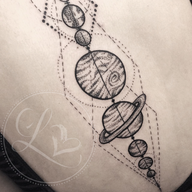 Dotwork geometric planets eye tattoo