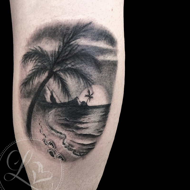 Black and grey realistic tattoo of a beach landscape at sunset with footprints in the sand and palm trees silhoueted