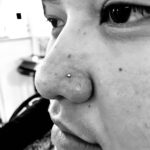 Nostril piercing with a crystal nostril screw, done by Lhena at Queen of Hearts - Wailuku, Maui