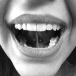 Tonuge "web" / frenulum piercing with a 16g curved barbell - done by Lhena - Queen of Hearts, Wailuku, Maui.