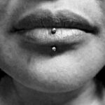 Vertical labret piercing with a 16g curved barbell - done by Lhena - Queen of Hearts, Wailuku, Maui